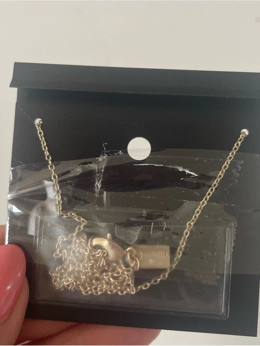 Coach Gold-Tone Necklace with White Enamel and Crystal-Accented Rings